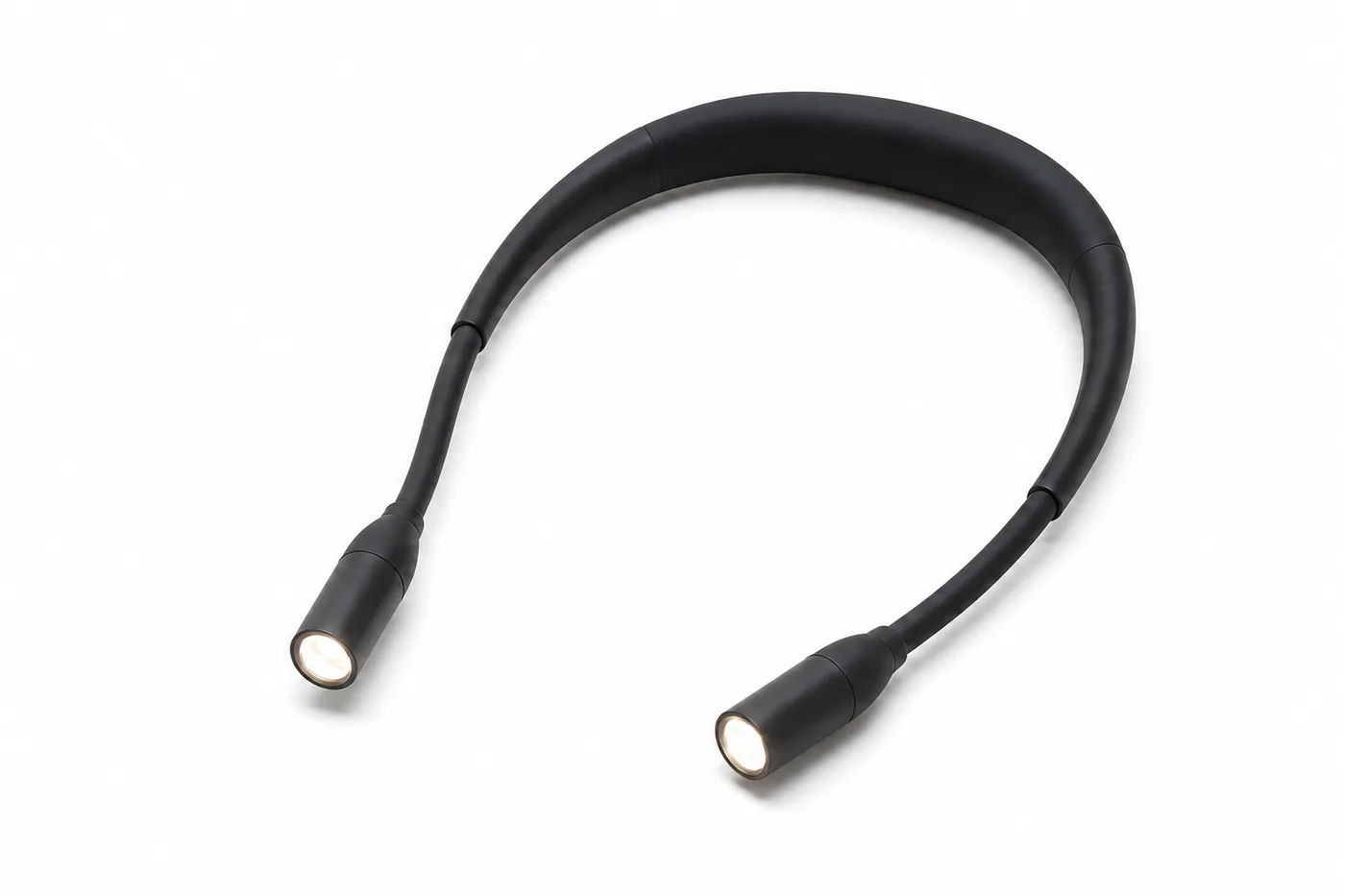 Black flexible rechargeable neck craft light on a clean surface
